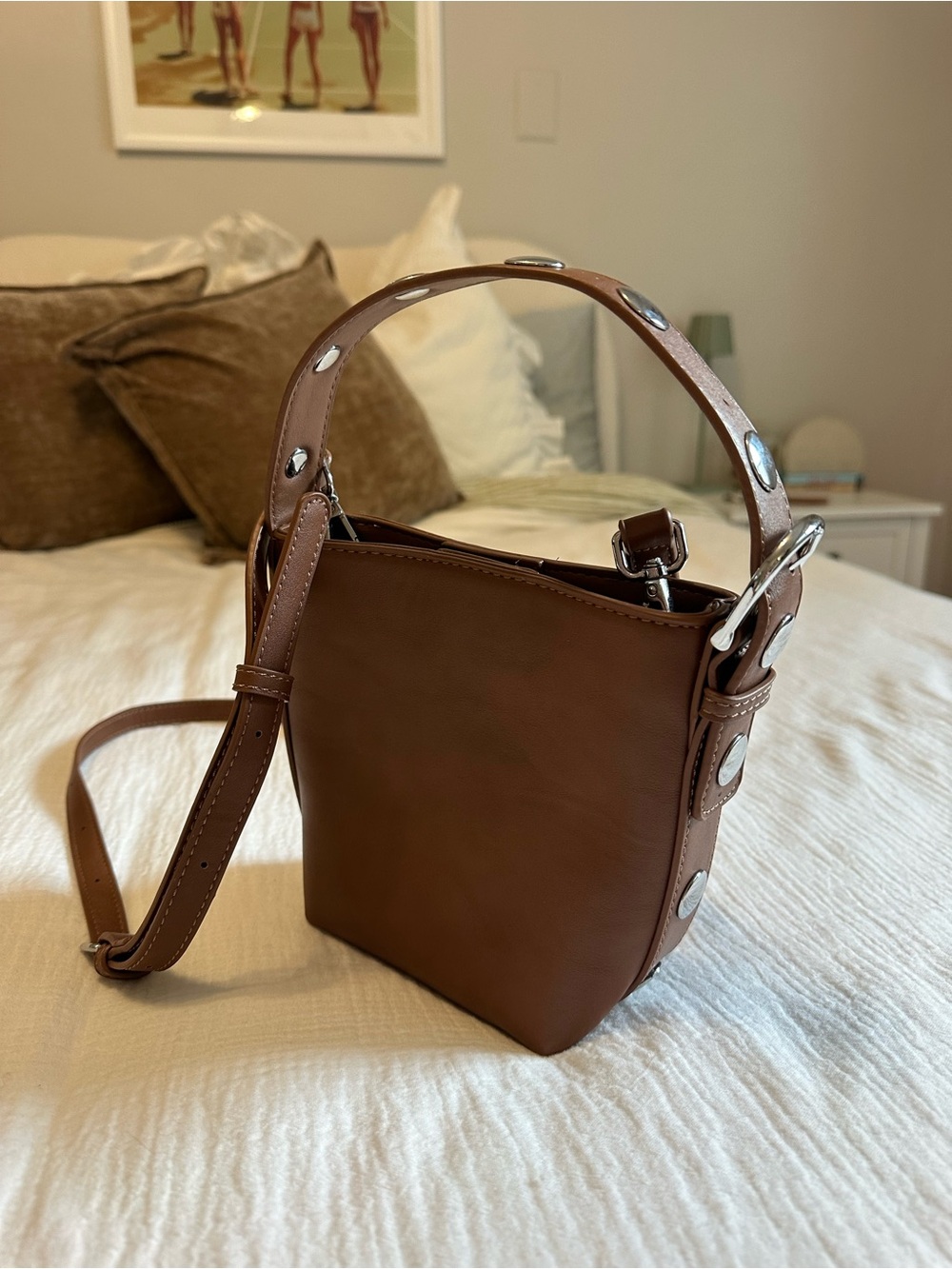 Silver studded leather bucket bag